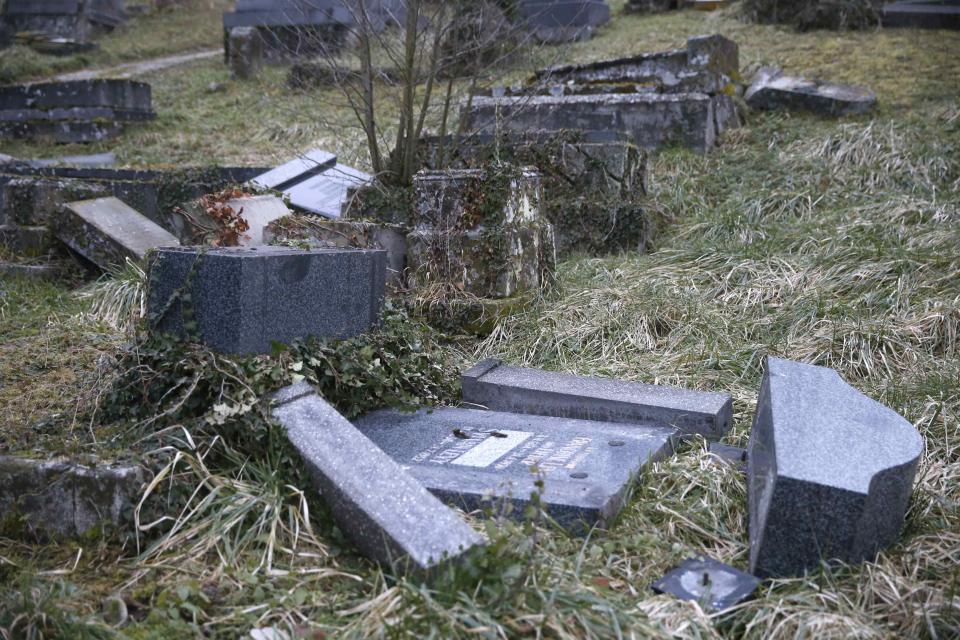 Desecrated tombstones are seen at the Sarre-Union Jewish cemetery, eastern France