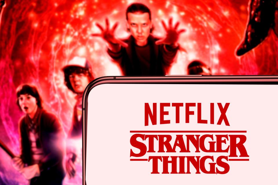 United States, New York. Sunday, September 29, 2019.Computer keyboard with the Iphone 11 pro with the Stranger Things logo. Stranger Things is an Amer