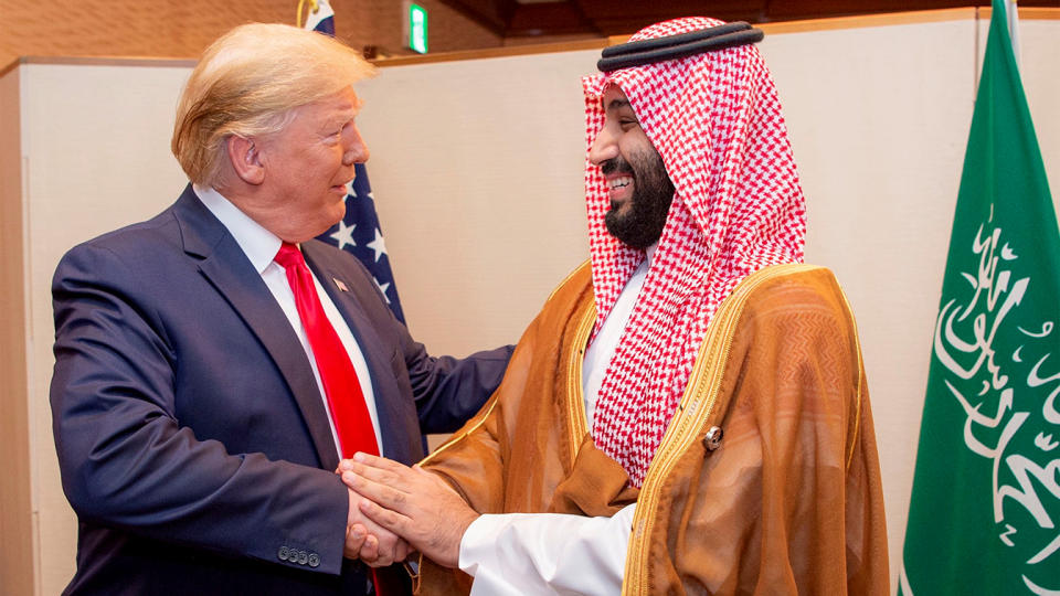 Saudi Arabia's Crown Prince Mohammed bin Salman shakes hands with U.S. President Donald Trump, at the G20 leaders summit in Osaka, Japan, June 29, 2019. Bandar Algaloud/Courtesy of Saudi Royal Court/Handout via REUTERS ATTENTION EDITORS - THIS PICTURE WAS PROVIDED BY A THIRD PARTY.