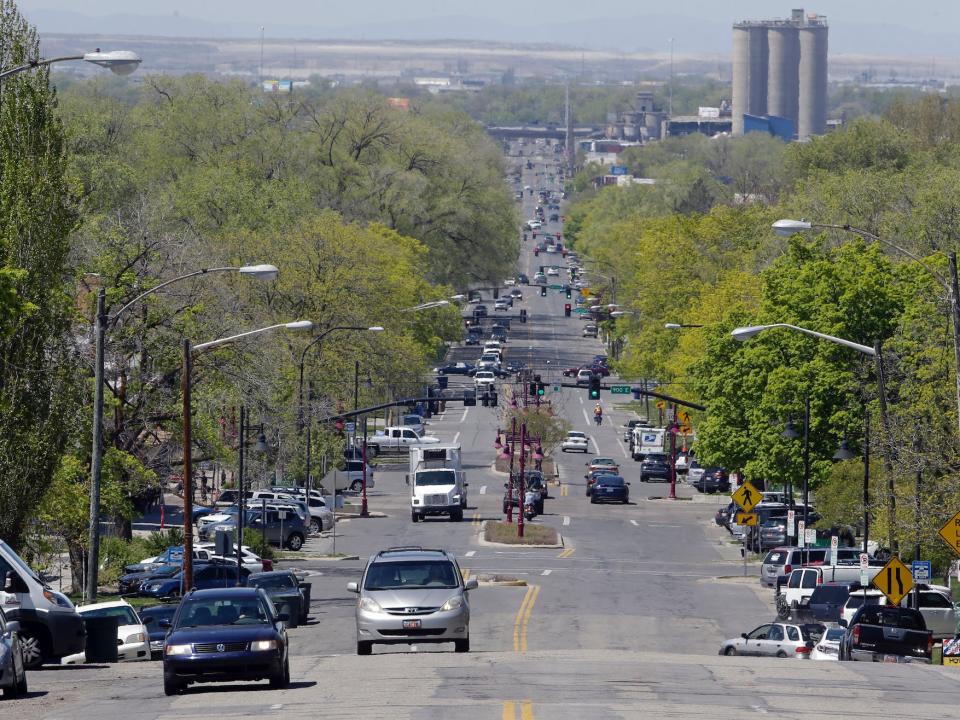 Cars ride along 900 South, Tuesday, April 19, 2016, in Salt Lake City.