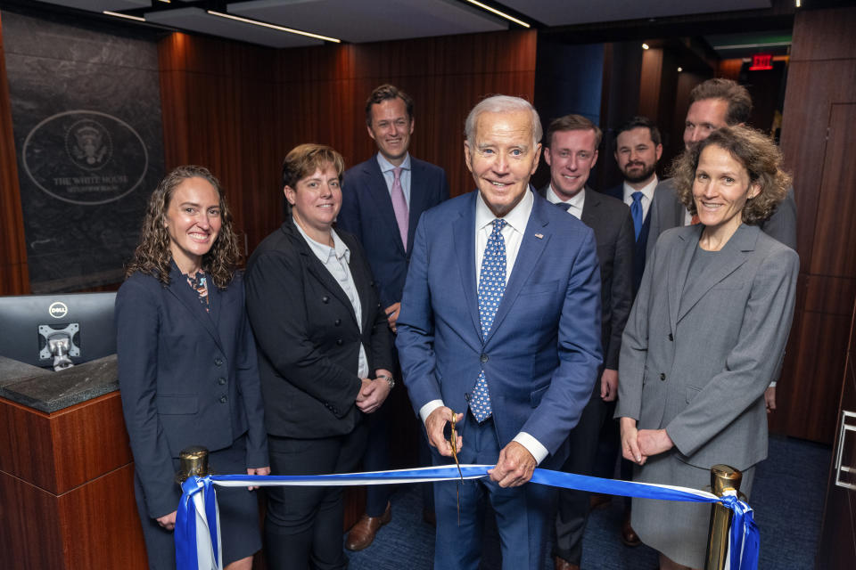 In this image provided by the White House, President Joe Biden stands in the reception area as he attends a ribbon cutting for the renovated White House Situation Room, Sept. 5, 2023, in the West Wing of the White House in Washington.The 5,500-square-foot, highly secure complex of conference rooms and offices in the West Wing has undergone a gut renovation that took a year to complete. (Adam Schultz/The White House via AP)