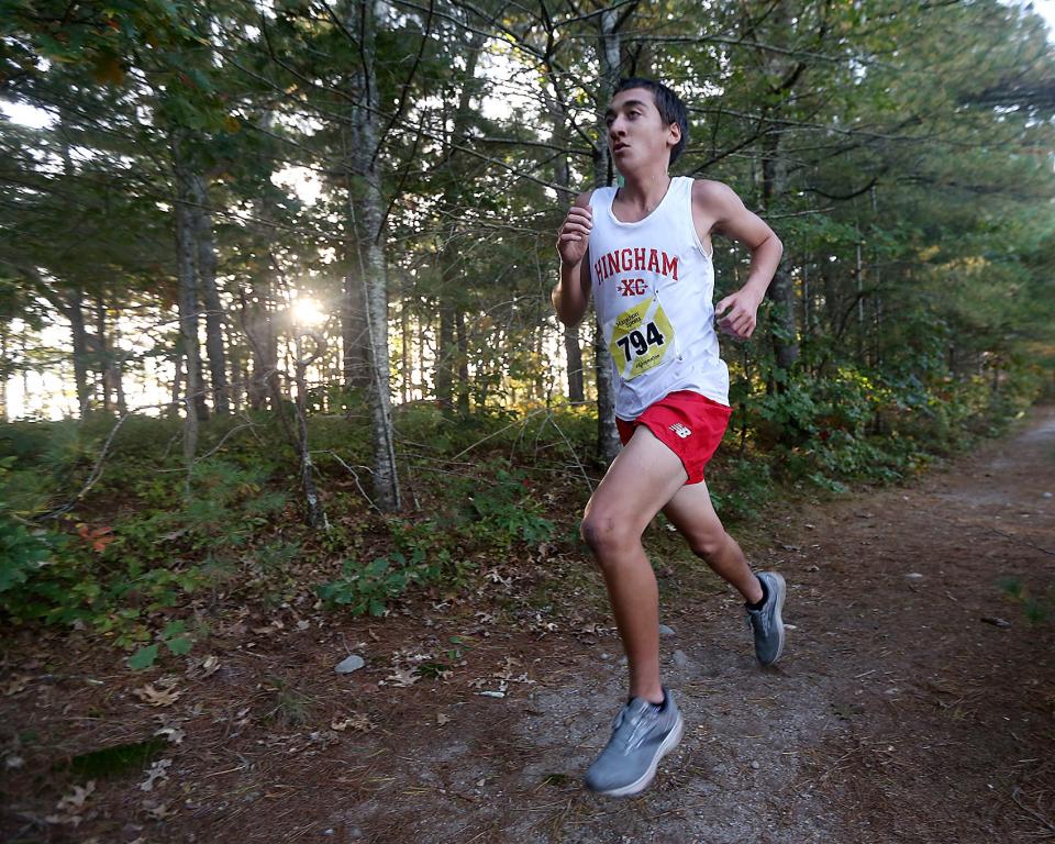 Hingham's Niko Gibson finishes strong to take 11th overall in their meet against Marshfield at Marshfield High on Wednesday, Oct. 12, 2022. Marshfield girls would win 19-39 while Marshfield boys won 19-44.