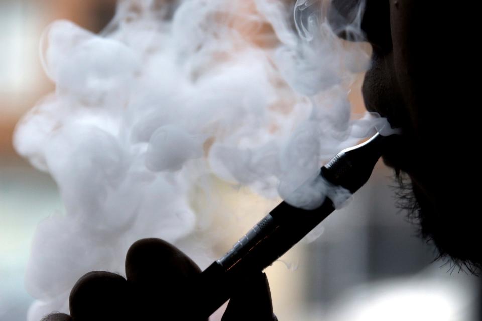 Electronic cigarette maker Juul Labs agreed to settle a multi-state investigation by paying $438 million and changing its marketing practices.