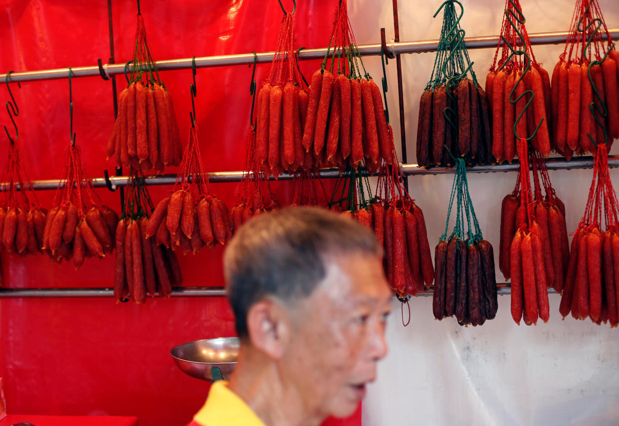 "La rou", cured pork sausages, are displayed at a Chinese New Year market in Singapore January 23, 2020. REUTERS/Feline Lim