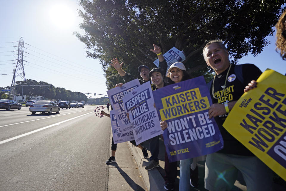 Kaiser Permanente workers picket Wednesday, Oct. 4, 2023, in Irvine, Calif. Some 75,000 Kaiser Permanente hospital employees who say understaffing is hurting patient care walked off the job Wednesday in five states and the District of Columbia, kicking off a major health care worker strike. (AP Photo/Ryan Sun)