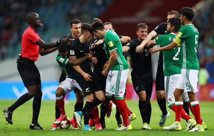 Mexico and New Zealand players brawl before a VAR howler