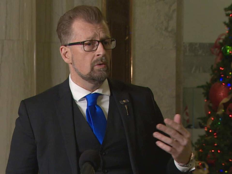 Mike Ellis, associate minister of mental health and addictions, takes questions from media Monday about a proposed legislature committee to examine safe supply policies.  (Nathan Gross/CBC News  - image credit)