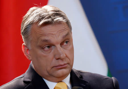 FILE PHOTO: Hungarian Prime Minister Viktor Orban speaks during a press conference in Budapest, Hungary, April 10, 2018. REUTERS/Bernadett Szabo/File Photo