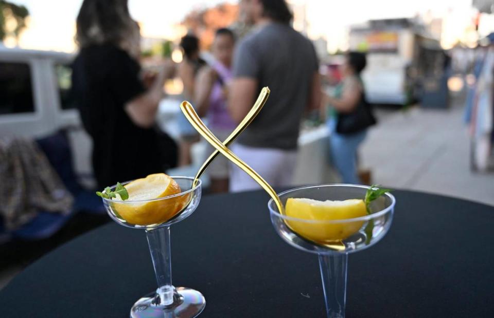 Empty champagne glasses co-owners Jordan Sanchez and Tami Waters used to serve samples of Lemon Granita Italian ice n cored lemons from their new Gelateria Del Centro, an authentic Italian gelato and ice cream shop opening in September alongside the Warnors Center in downtown Fresno. Photographed Thursday, Aug. 3, 2023.