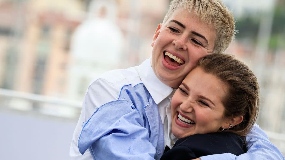 Director Molly Manning Walker and actress Mia McKenna-Bruce pose during the 76th Cannes Film Festival, May 19, 2023. - VALERY HACHE/AFP via Getty Images