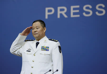 Qiu Yanpeng, deputy commander of the People's Liberation Army (PLA) Navy, arrives for a news conference ahead of the 70th anniversary of the founding of Chinese People's Liberation Army Navy, in Qingdao, China, April 20, 2019. REUTERS/Jason Lee