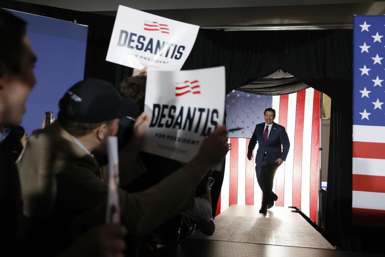 Republican presidential candidate Ron DeSantis greets an audience in West Des Moines, Iowa, on caucus night on Jan. 15, 2024. <a href="https://www.gettyimages.com/detail/news-photo/republican-presidential-candidate-florida-gov-ron-desantis-news-photo/1936462663?adppopup=true" rel="nofollow noopener" target="_blank" data-ylk="slk:Anna Moneymaker/Getty Images;elm:context_link;itc:0;sec:content-canvas" class="link ">Anna Moneymaker/Getty Images</a>