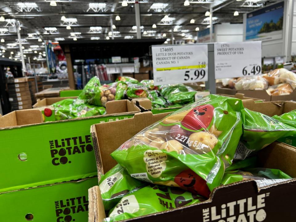 Bags of red and white little potatoes at Costco.