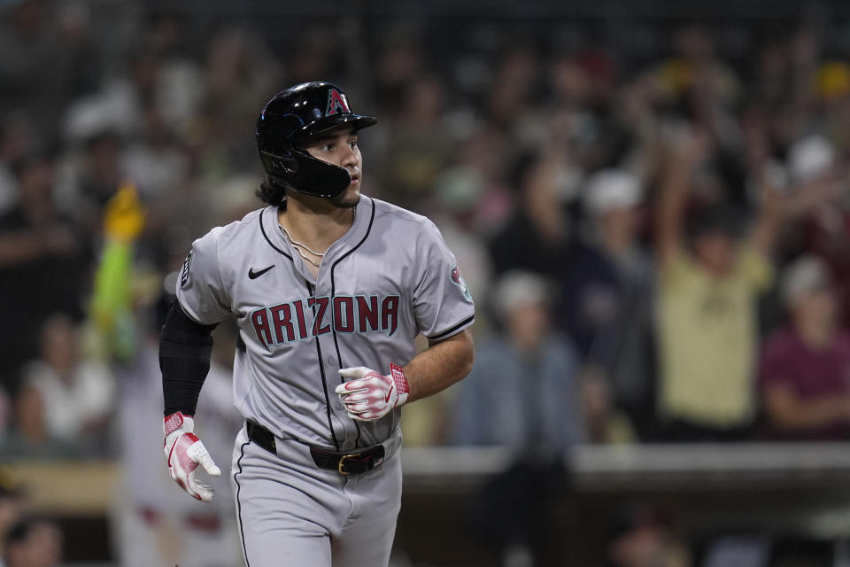 Arizona Diamondbacks' Alek Thomas watches his grand slam during the ninth inning of a baseball game against the San Diego Padres, Friday, July 5, 2024, in San Diego. (AP Photo/Gregory Bull)