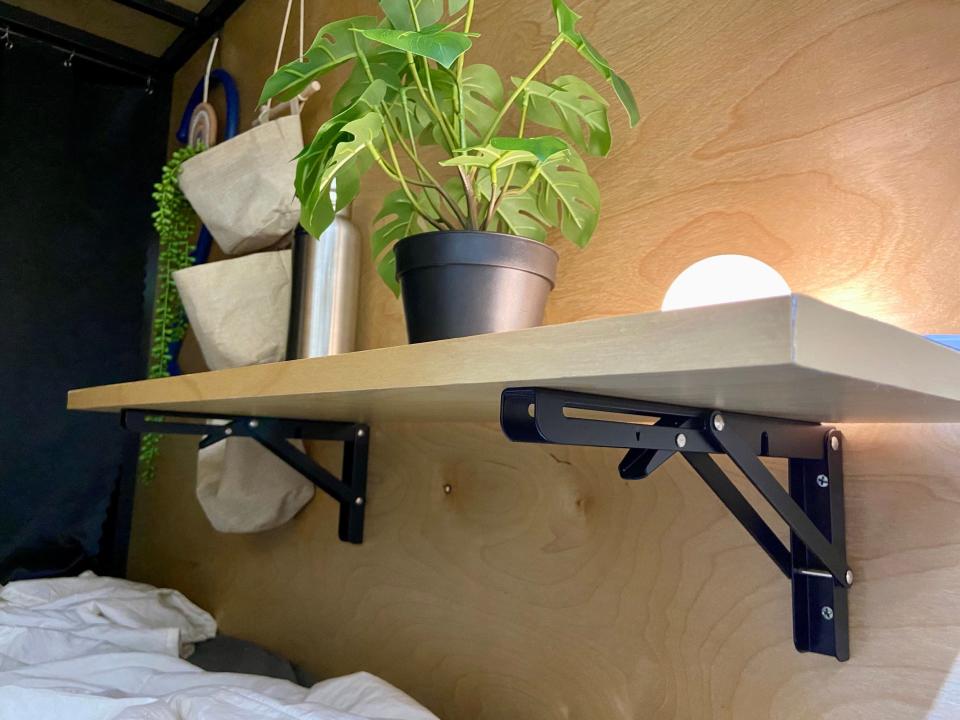Inside a compact sleep pod in co-living house