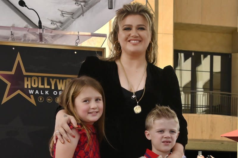 Kelly Clarkson (C) and her children River Rose (L) and Remy attend her Hollywood Walk of Fame ceremony in 2022. File Photo by Jim Ruymen/UPI