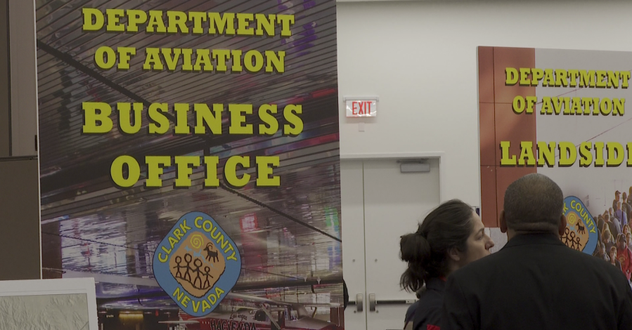 Job seekers learn of opportunities at the Harry Reid International Airport Career Expo Thursday morning at the Las Vegas Convention Center. (Lauren Negrete/KLAS)