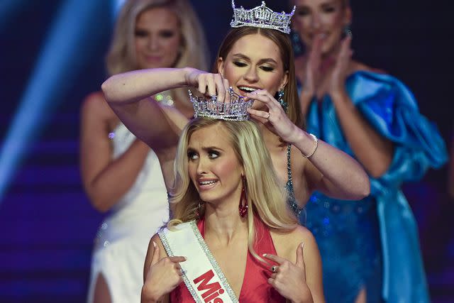 <p>Joe Marino/UPI/Shutterstock</p> Madison Marsh is crowned by Miss America 2023, Grace Stanke