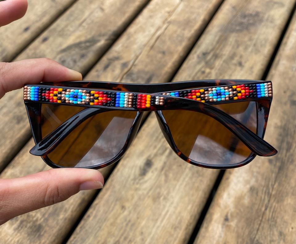 Similar glasses sell for <a href="https://www.etsy.com/listing/524740845/sale-hand-beaded-sunglasses-boss?ref=shop_home_active_12" target="_blank" rel="noopener noreferrer">around $35</a>. (Photo: Rebelina)