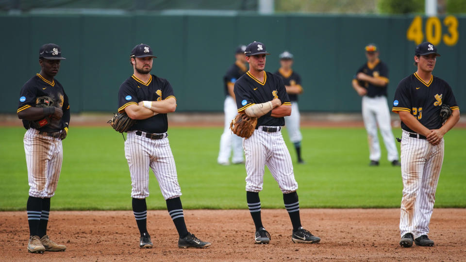 CEDAR RAPIDS, IA - JUNE 05: Birmingham-Southern Panthers infielders wait during a pitching change during the Division III Men's Baseball Championship held at Perfect Game Field at Veterans Memorial Stadium on June 5, 2019 in Cedar Rapids, Iowa. Chapman defeated Birmingham-Southern 11-0 to win the championship. (Photo by Jack Dempsey/NCAA Photos via Getty Images)