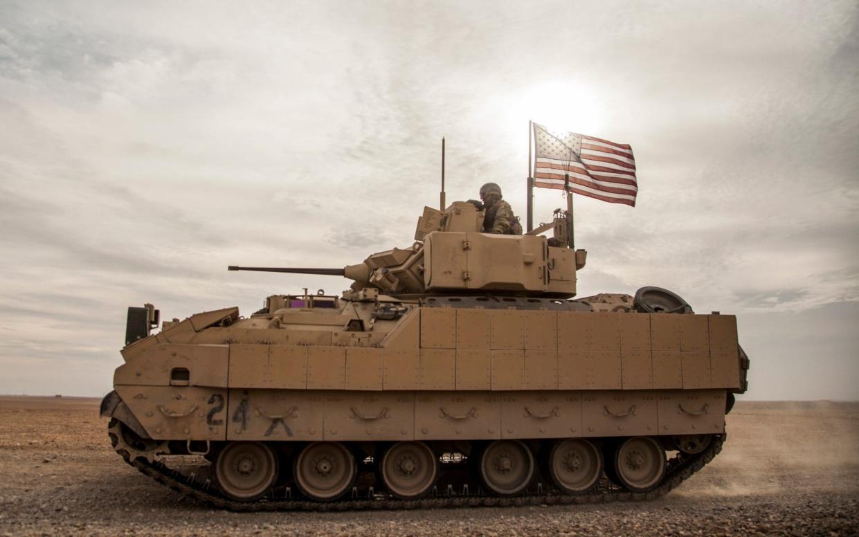 A US tank in Syria’s Deir Ez-Zor province. The region has seen a number of recent strikes on coalition forces - AP