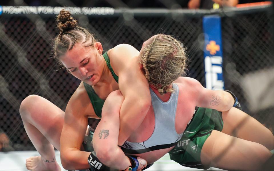Nov 12, 2022; New York, NY, USA; Erin Blanchfield (red gloves) and Molly McCann (blue gloves) during UFC 281 at Madison Square Garden. Mandatory Credit: Jessica Alcheh-USA TODAY Sports