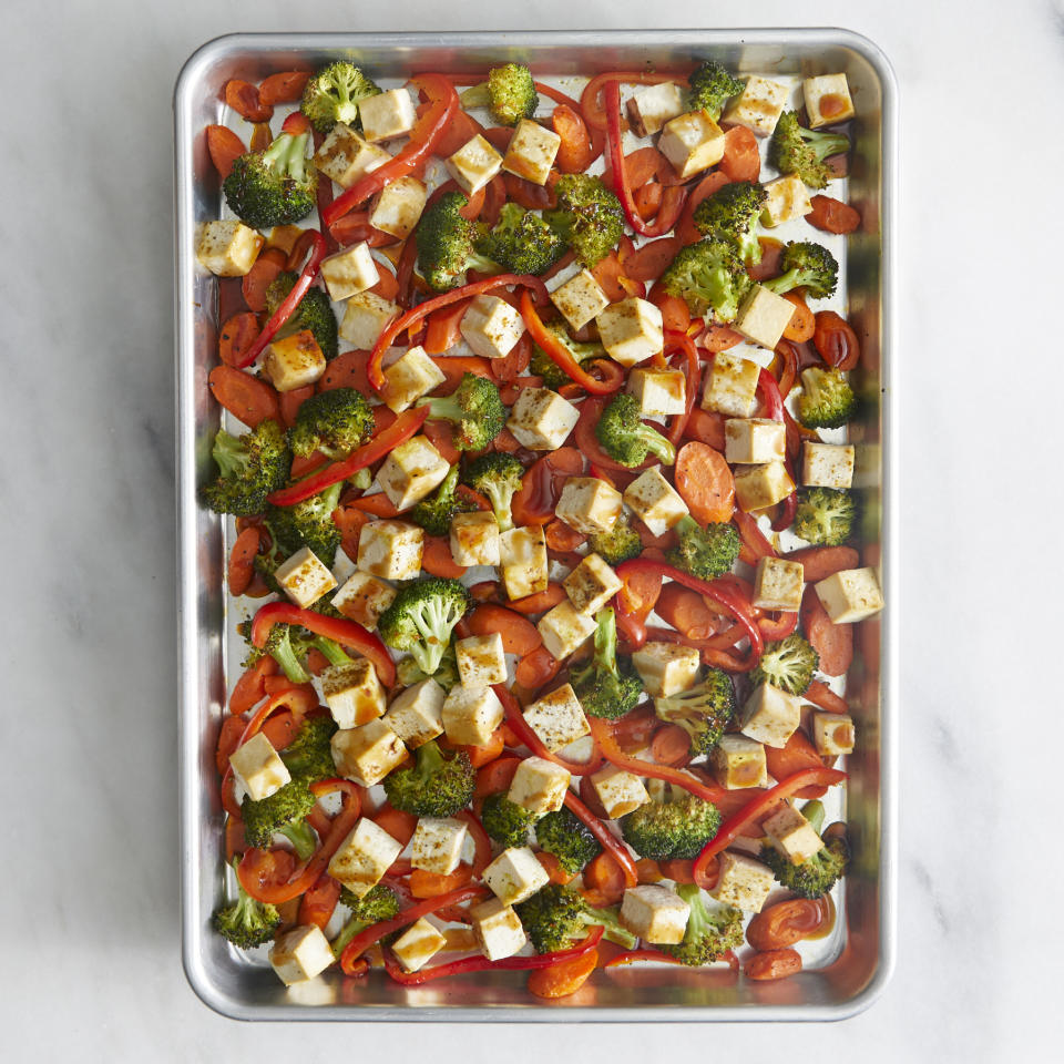 <p>With just one sheet pan and 35 minutes, you can get a flavorful vegetarian dinner on the table. The carrots get a head start in the oven to ensure they are cooked through, while a drizzle of teriyaki sauce at the end ties everything together. Serve with brown rice, if desired. <a href="https://www.eatingwell.com/recipe/7995065/sheet-pan-teriyaki-tofu-with-carrots-broccoli/" rel="nofollow noopener" target="_blank" data-ylk="slk:View Recipe" class="link ">View Recipe</a></p>