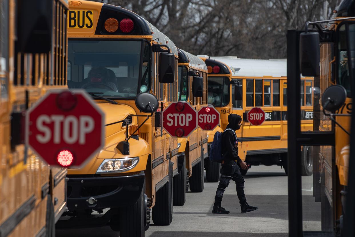 Students board JCPS school buses at Western High School on Wednesday afternoon. March 16, 2022