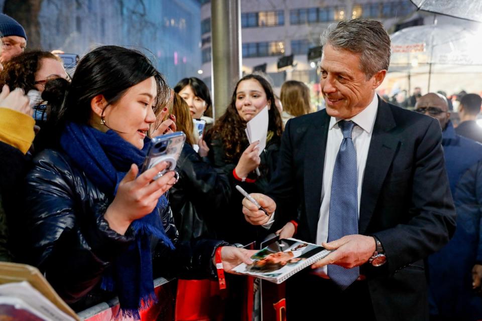 Grant singing autographs at the ‘D&D’ premiere (Getty Images for eOne)