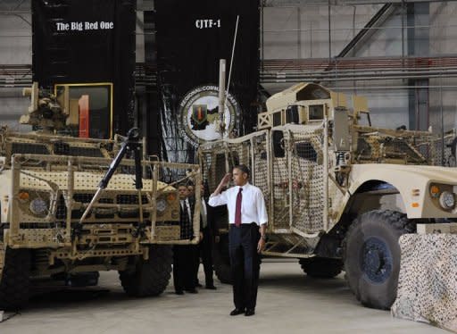 US President Barack Obama salutes as he arrives to address troops during a visit to Bagram Air Field in Afghanistan. Obama signed a US-Afghanistan strategic partnership agreement during his unannounced visit to the country