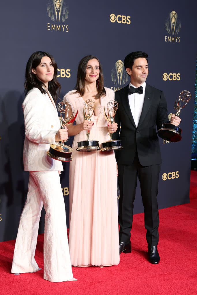 LOS ANGELES, CALIFORNIA - SEPTEMBER 19: (L-R) Jen Statsky, Lucia Aniello, and Paul W. Downs, winners of Outstanding Writing For A Comedy Series and Outstanding Directing For A Comedy Series for 'Hacks,' pose in the press room during the 73rd Primetime Emmy Awards at L.A. LIVE on September 19, 2021 in Los Angeles, California. (Photo by Rich Fury/Getty Images)