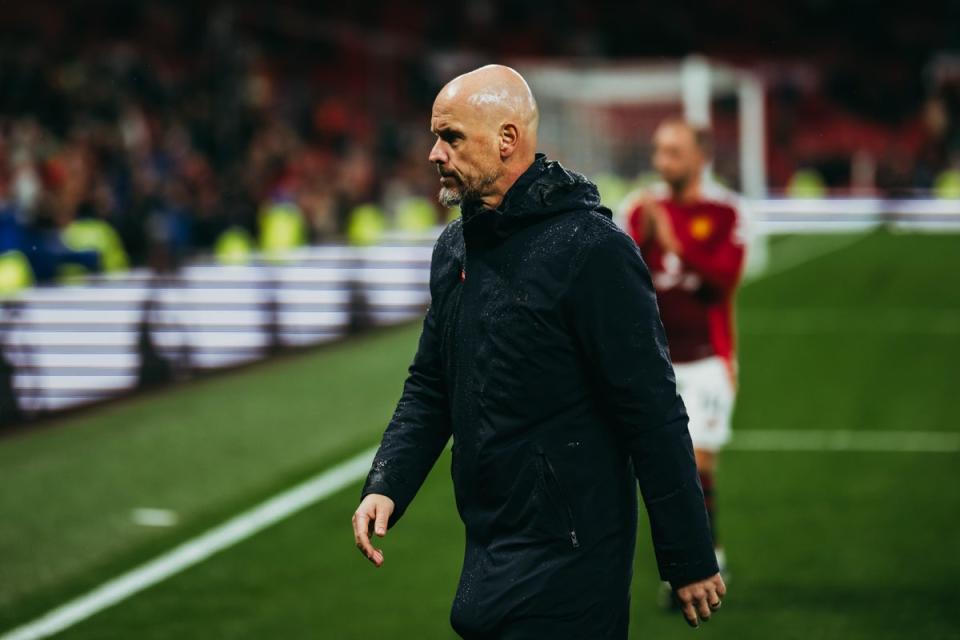 Eriksen walks off behind Ten Hag (Manchester United via Getty Imag)