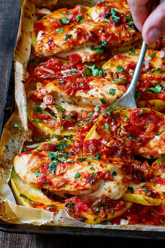 <p>Eat Well 101</p><p>This well-balanced, sheet-pan chicken dinner cuts down kitchen time without compromising on taste and nutrition.</p><p><strong>Get the recipe: </strong><a href="https://www.eatwell101.com/baked-chicken-breasts-recipe-spaghetti-squash" rel="nofollow noopener" target="_blank" data-ylk="slk:One-Pan Salsa Chicken with Spaghetti Squash;elm:context_link;itc:0;sec:content-canvas" class="link "><strong>One-Pan Salsa Chicken with Spaghetti Squash</strong></a></p>