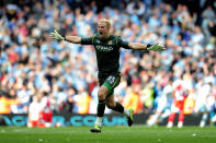 MANCHESTER, ENGLAND - MAY 13: Goalkeeper Joe Hart of Manchester City celebrates winning the title as the final whistle blows during the Barclays Premier League match between Manchester City and Queens Park Rangers at the Etihad Stadium on May 13, 2012 in Manchester, England. (Photo by Shaun Botterill/Getty Images)