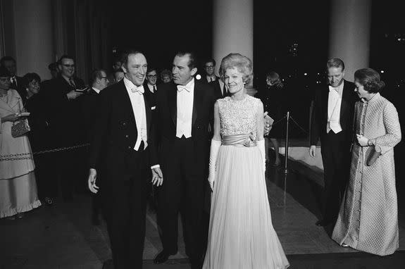 President Richard Nixon and first lady Pat Nixon greet Pierre Elliott Trudeau.