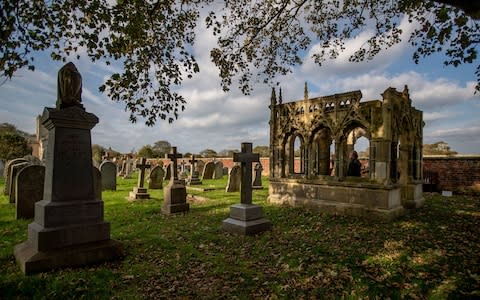 The graveyard of 12th-century St Oswald’s Church - Credit: Charlotte Graham