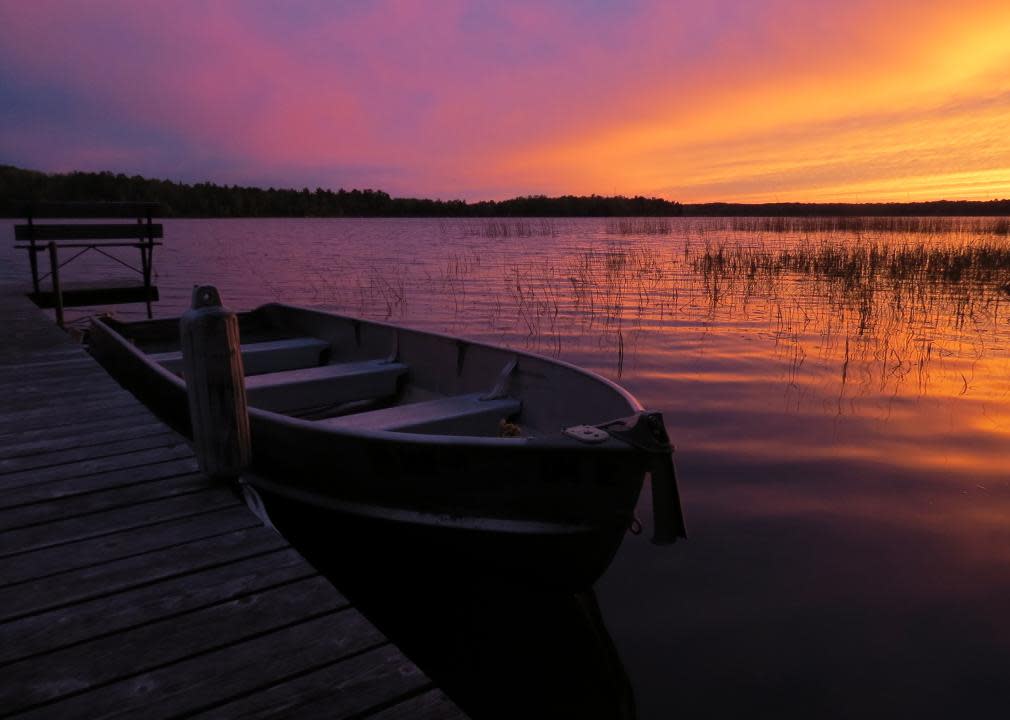 Sunset with Fishing Boat and Dock.