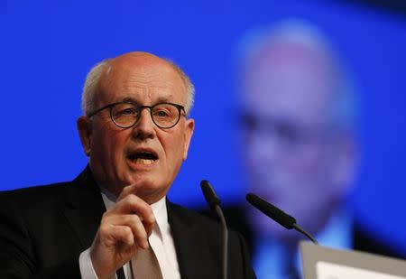 Conservative Christian Democratic Union party CDU parliamentary floor leader Volker Kauder addresses the CDU party convention in Essen, Germany, December 7, 2016. REUTERS/Wolfgang Rattay