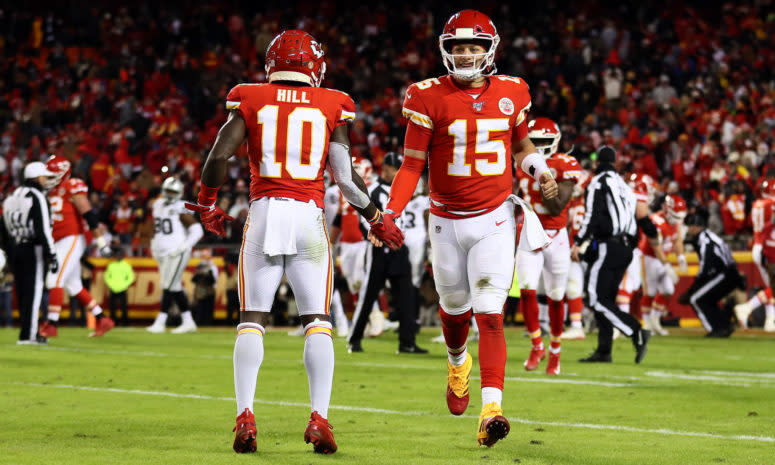 Patrick Mahomes celebrates with Tyreek Hill.