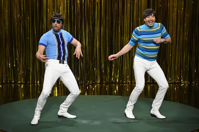 <p>Todd Owyoung/NBC via Getty Images</p> Matthew McConaughey and Jimmy Fallon dancing on <em>The Tonight Show Starring Jimmy Fallon</em> Jan. 11, 2024