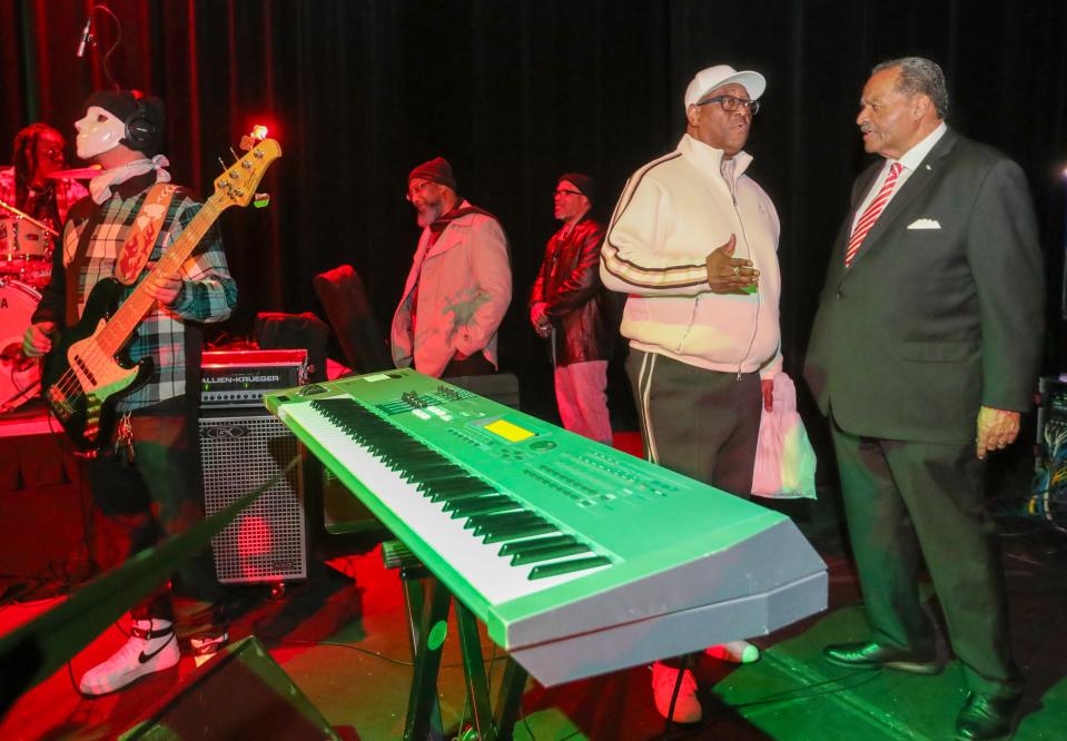 Marco Sommerville, deputy mayor for intergovernmental affairs, talks with Grammy-award-winning artist Kevin Dorsey before a jazz concert at the Akron Civic Theatre. Sommerville asked Dorsey to help Akron recruit more Black artists to Akron.