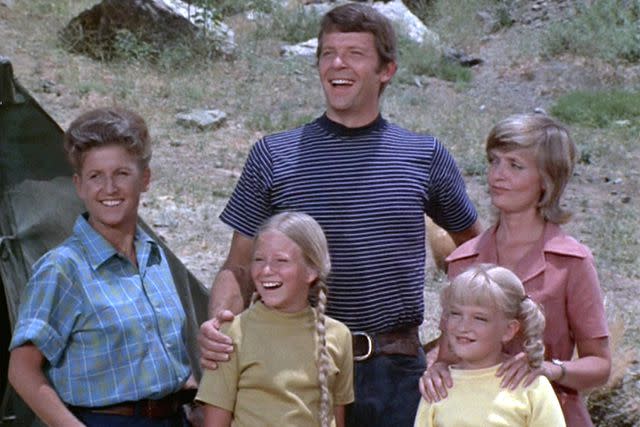 <p>CBS via Getty</p> A scene from "The Brady Bunch" TV show with Ann B. Davis as Alice Nelson, Eve Plumb as Jan Brady, Robert Reed as Mike Brady, Susan Olsen as Cindy Brady and Florence Henderson as Carol Brady