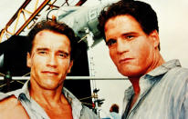 <b>Movie star stunt doubles</b><br><br> <b>Separated at birth…</b> it’s the ‘True Lies’ set, with <b>Arnold Schwarzenegger</b> alongside regular stunt double Billy Lucas, who is heavily made up. The pair are close; Arnie visited Lucas in hospital in 2010. (Credit: Rex) <br><br><b>[Related gallery: <a href="http://uk.movies.yahoo.com/photos/best-movie-star-lookalikes-slideshow/" data-ylk="slk:Best movie star lookalikes;elm:context_link;itc:0;sec:content-canvas;outcm:mb_qualified_link;_E:mb_qualified_link;ct:story;" class="link  yahoo-link">Best movie star lookalikes</a>]</b>