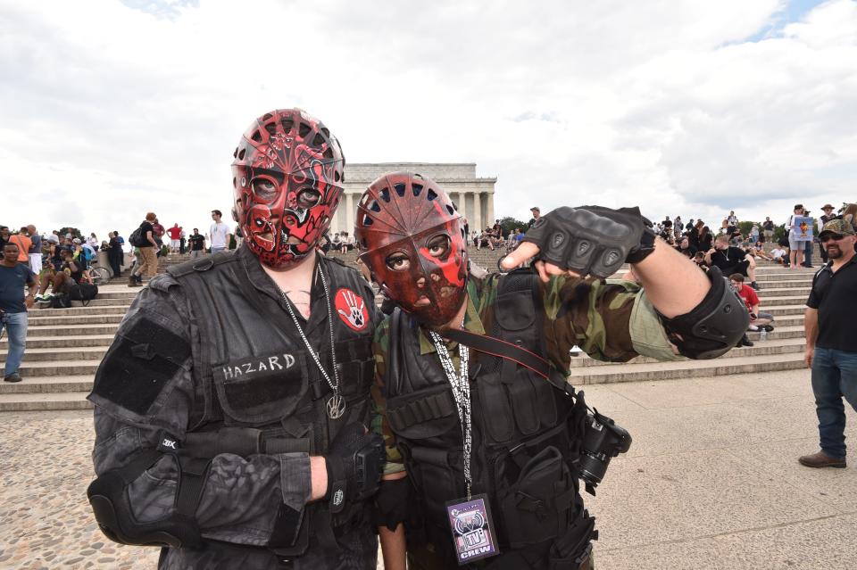 <p>Masked supporters of the US rap group Insane Clown Posse, known as Juggalos, gather on Sept. 16, 2017 near the Lincoln Memorial in Washington to protest at a 2011 FBI decision to classify their movement as a gang. (Photo: Paul J. Richards/AFP/Getty Images) </p>