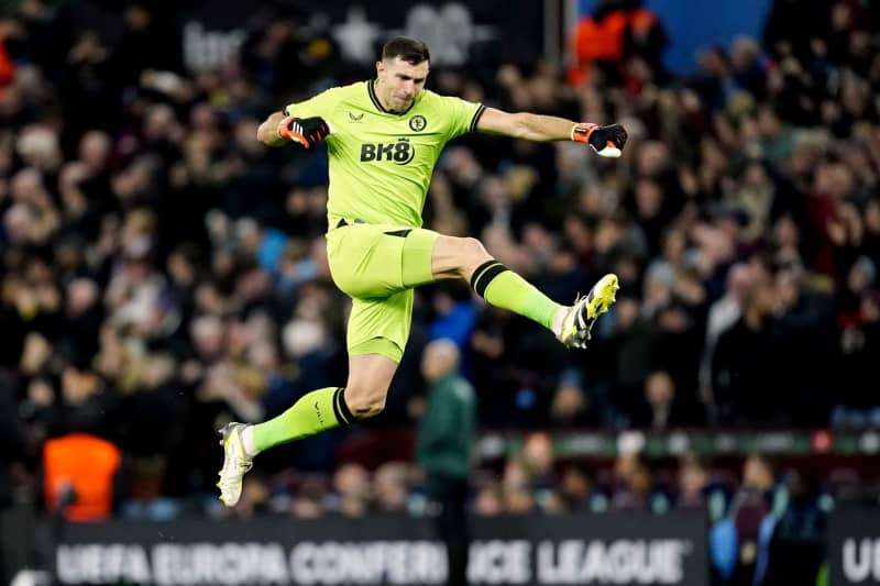 Aston Villa goalkeeper Emiliano Martinez celebrates their side's first goal of the game by teammate Ollie Watkins (not pictured) during the UEFA Europa League Round of 16, second leg soccer match between Aston Villa and Ajax at Villa Park. Nick Potts/PA Wire/dpa