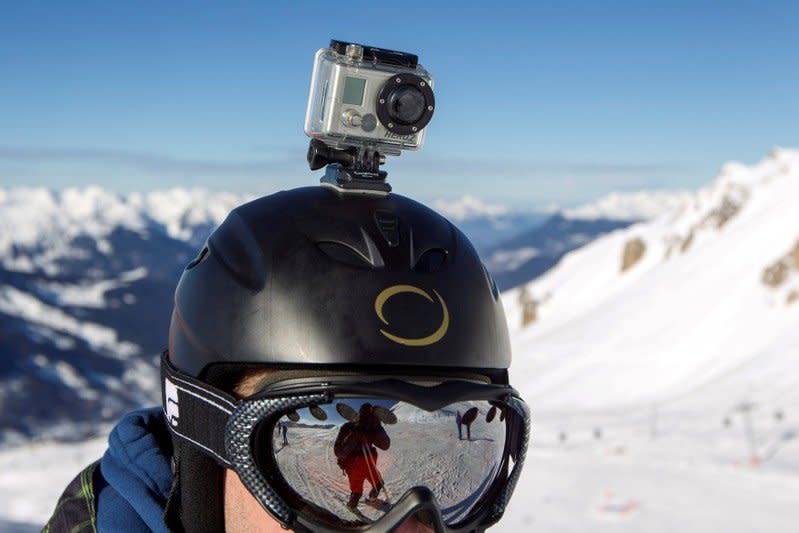 FILE PHOTO: A GoPro camera is seen on a skier's helmet as he rides down the slopes in the ski resort of Meribel, French Alps, January 7, 2014.    REUTERS/Emmanuel Foudrot/File Photo