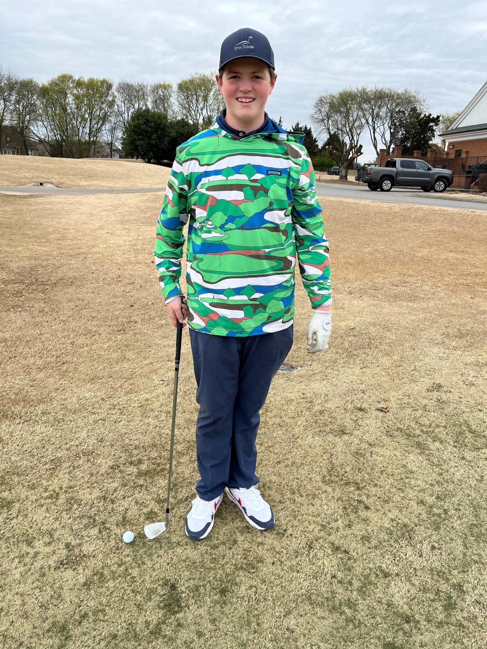 Jake Sheffield poses with his wedge at the Willow Creek Golf Club in Farragut on March 9. The 14-year-old will compete in the national finals of the Drive, Chip and Putt competition at Augusta National Golf Club on April 2.