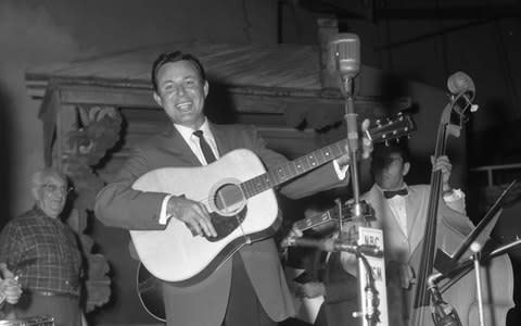 Jim Reeves on the Grand Ole Opry, September 3, 1960 - Credit: Country Music Hall of Fame and Museum/Getty Images 