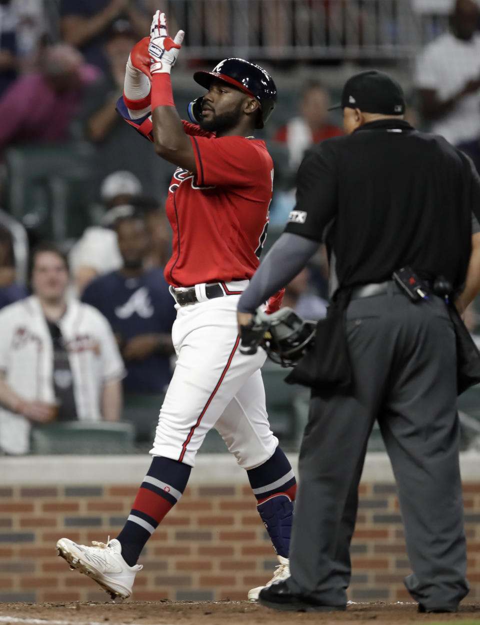 Atlanta Braves' Michael Harris II celebrates his two-run home run during the eighth inning of a baseball game against the Washington Nationals on Friday, July 8, 2022, in Atlanta. (AP Photo/Ben Margot)