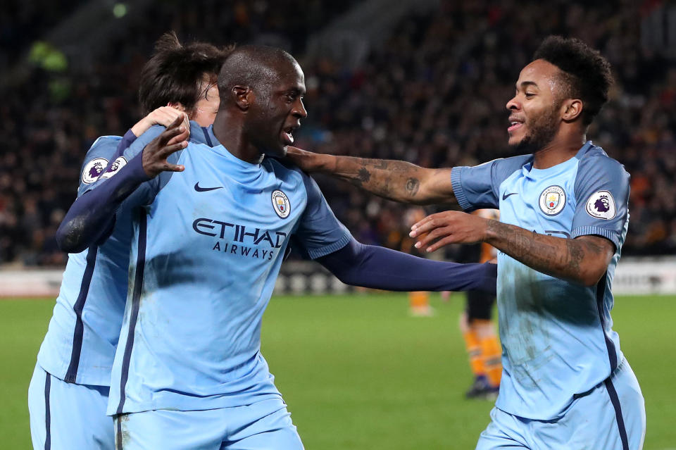 Manchester City's Yaya Toure (centre) celebrates scoring his side's first goal of the game during the Premier League match at the KCOM Stadium, Hull.